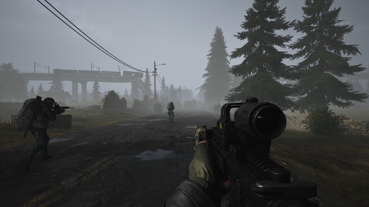 A foggy road beneath an elevated railway with a squad on the move — the sprawling outdoor terrain of ABI's larger maps.